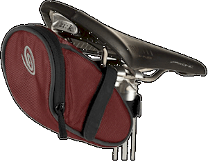 A seat-pack fits up under your saddle and carries all you need to keep you self-sufficient on the road or trail